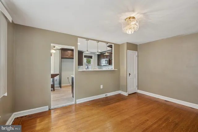 a view of a livingroom with wooden floor