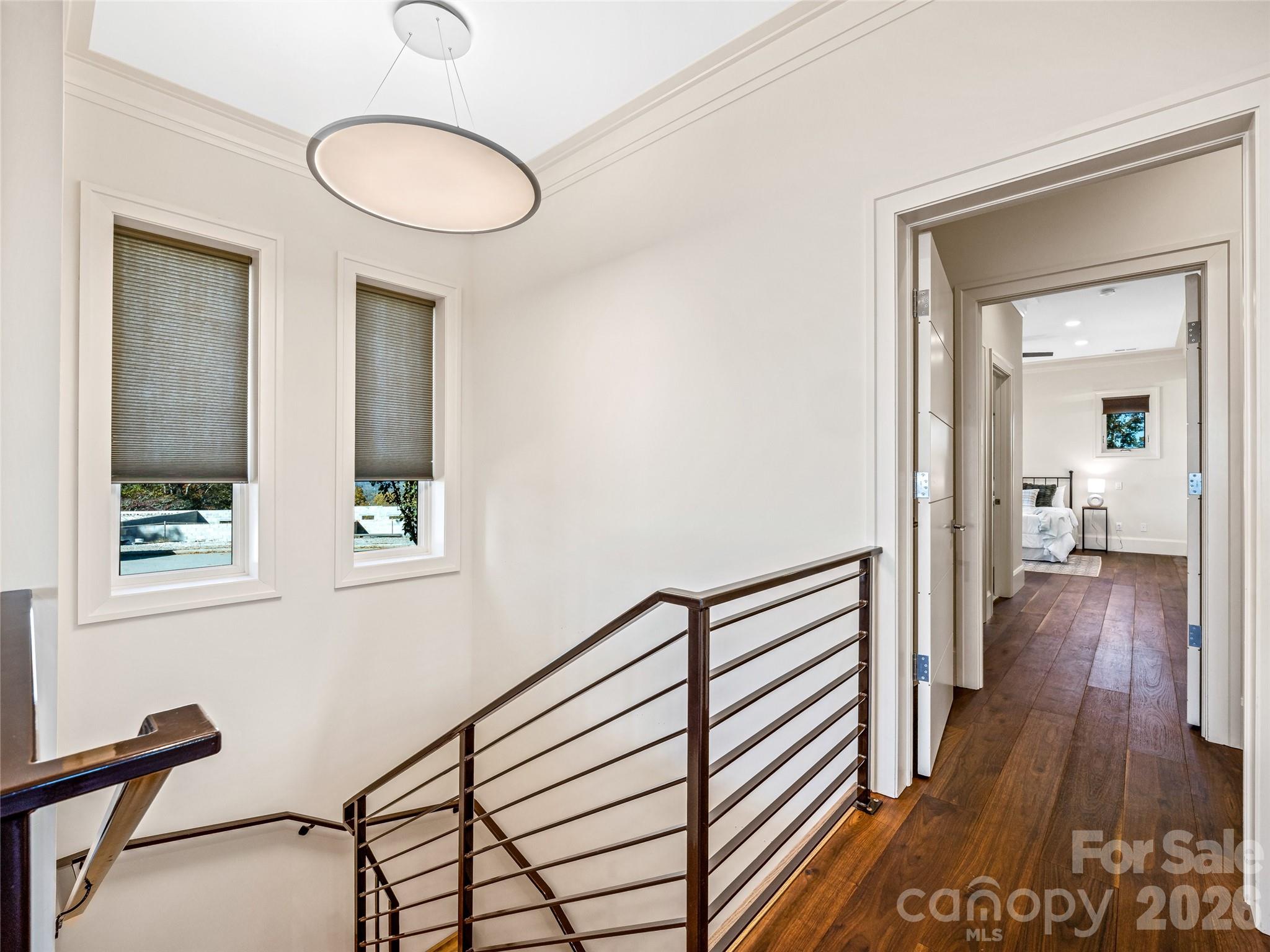 95 Horizon Hill Road Asheville, NC 28804 - Photo 26 of 47 a view of a hallway with wooden floor and staircase