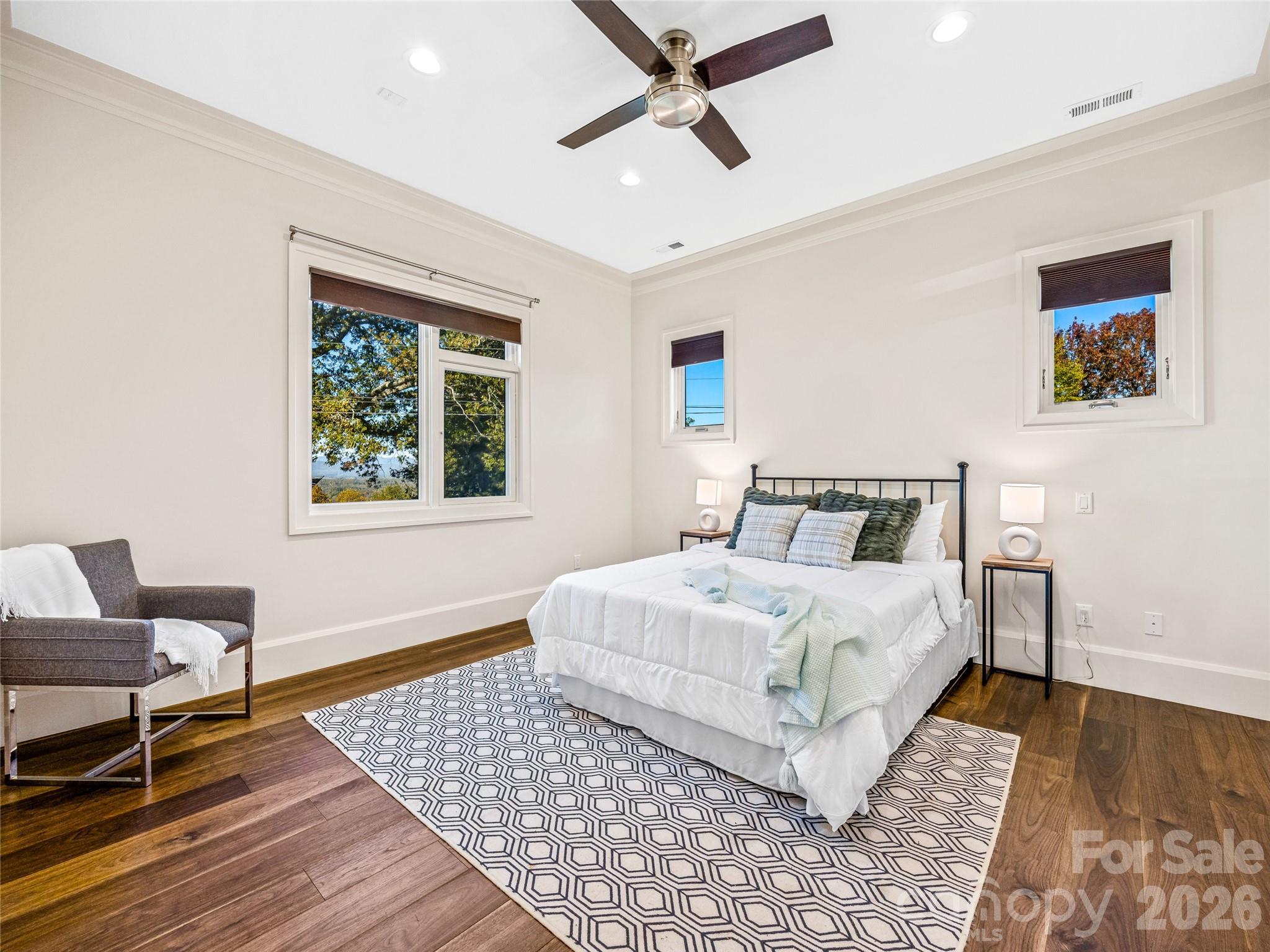 95 Horizon Hill Road Asheville, NC 28804 - Photo 28 of 47 a bedroom with a bed and wooden floor