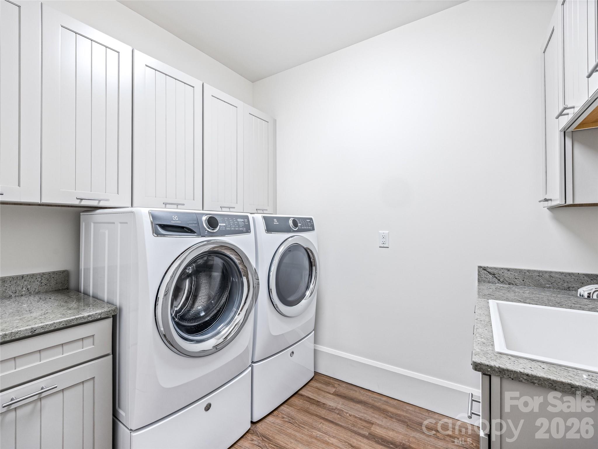 95 Horizon Hill Road Asheville, NC 28804 - Photo 38 of 47 a utility room with sink dryer and washer