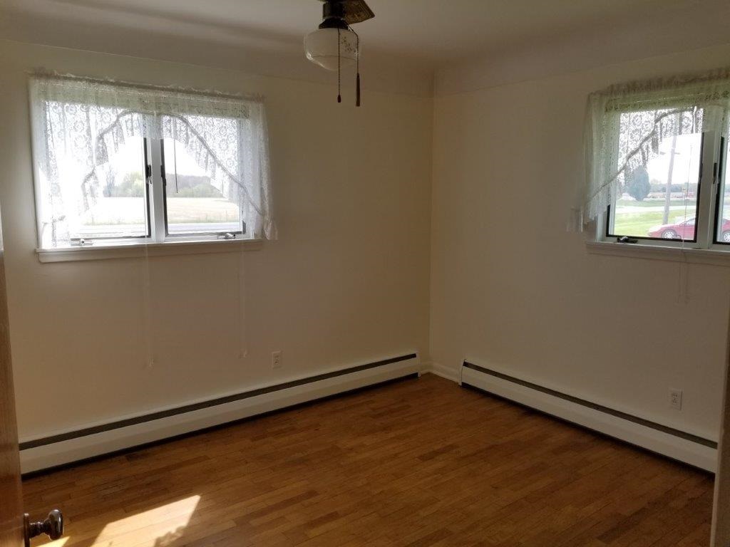 6160 South New Lothrop Road Durand, MI 48429 - Photo 17 of 34 2nd bedroom has 2 windows and looks very similar to the first.