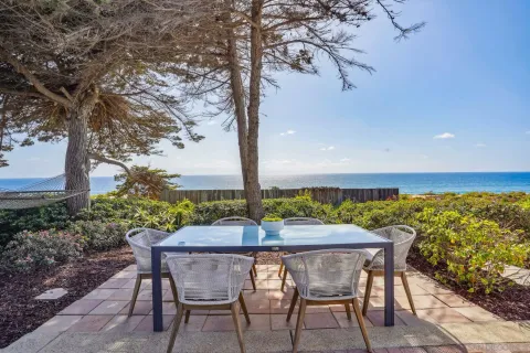 a view of a chairs and table on the terrace