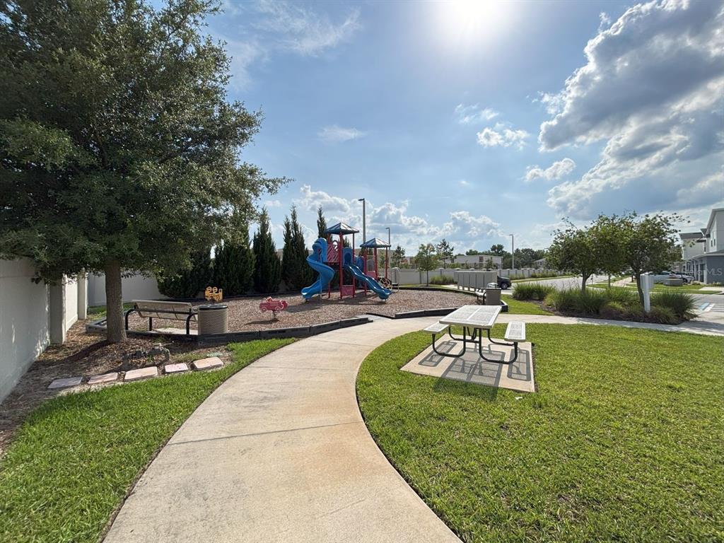 1005 Spring Palms Loop Orlando, FL 32828 - Photo 28 of 29 a view of a park with large trees
