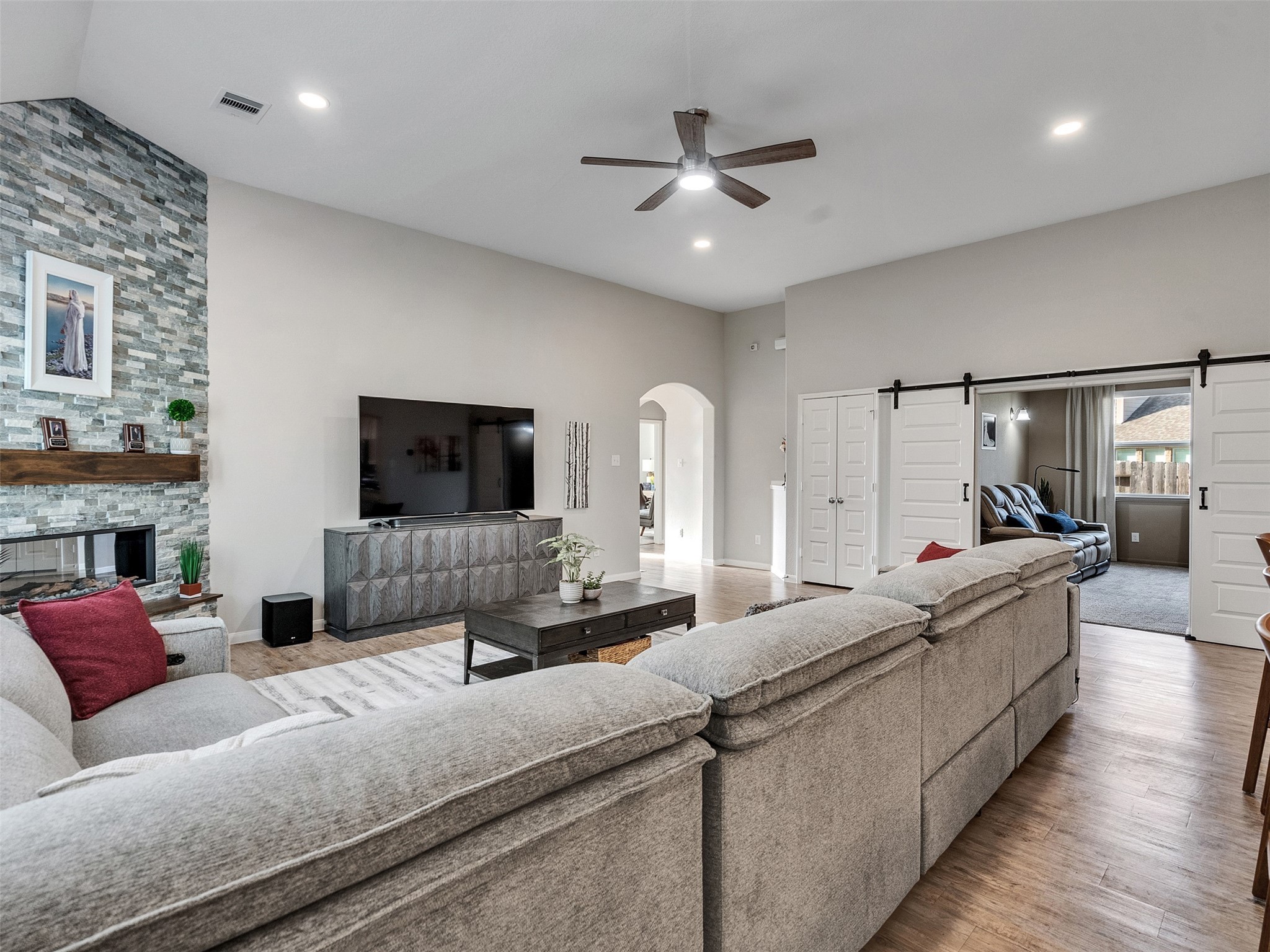 1841 Alyssa Way Alvin, TX 77511 - Photo 13 of 48 a living room with furniture and a flat screen tv