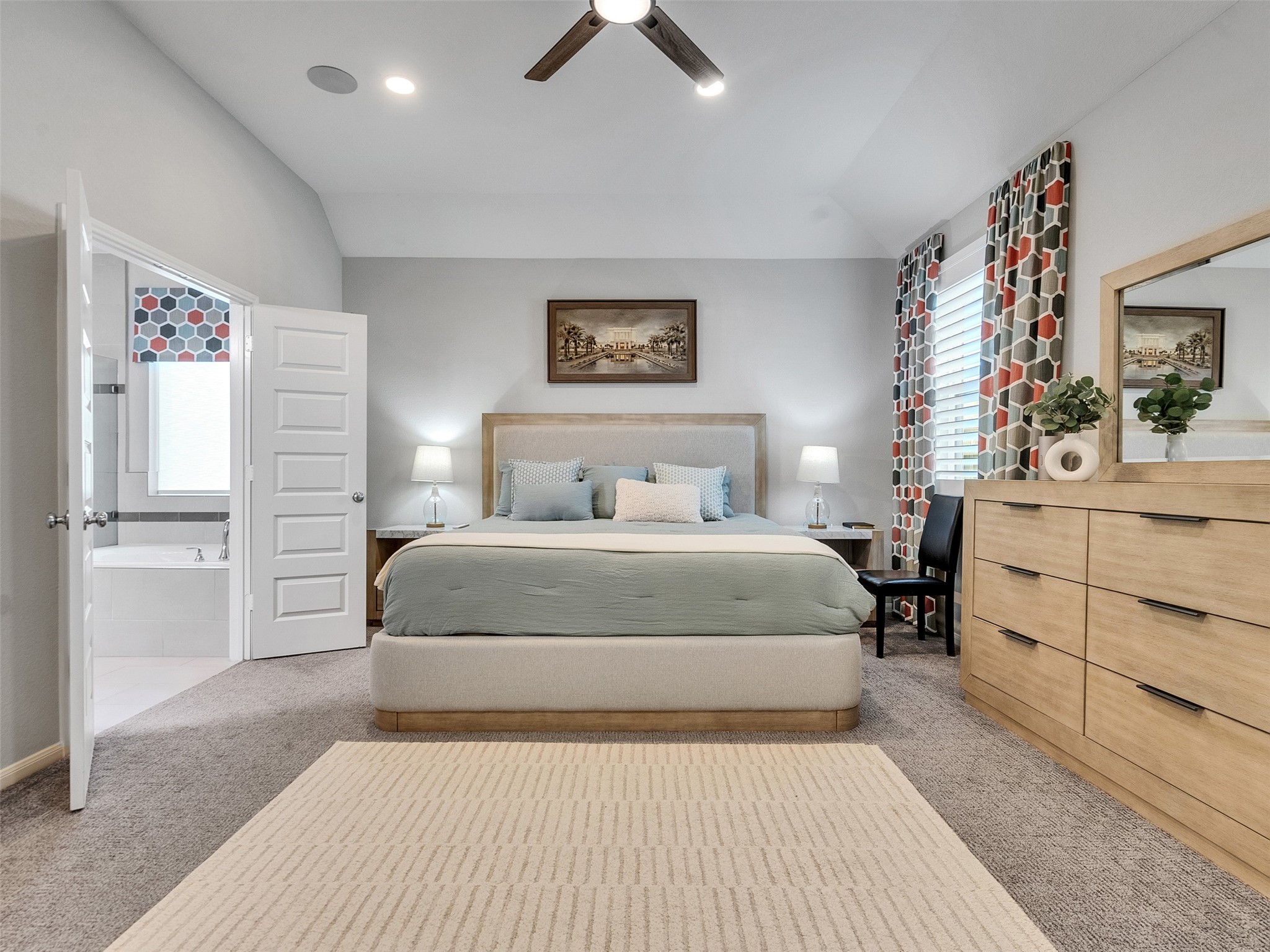 1841 Alyssa Way Alvin, TX 77511 - Photo 39 of 48 a bedroom with a large bed and a chandelier