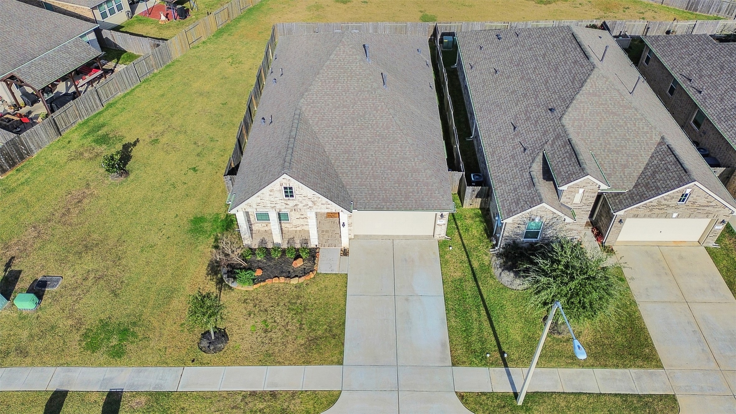1841 Alyssa Way Alvin, TX 77511 - Photo 4 of 48 an aerial view of a house with a garden