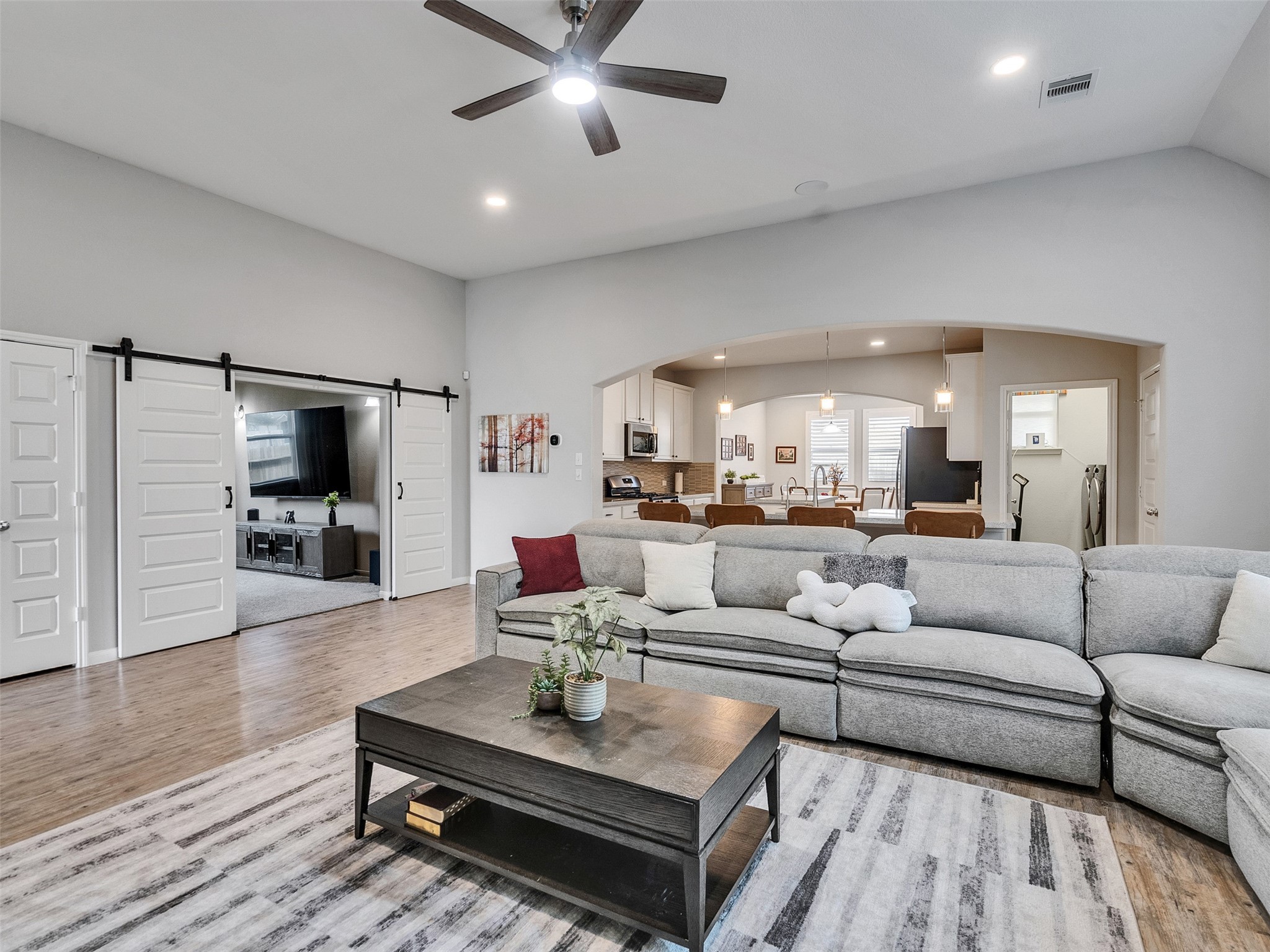 1841 Alyssa Way Alvin, TX 77511 - Photo 6 of 48 a living room with furniture and a flat screen tv