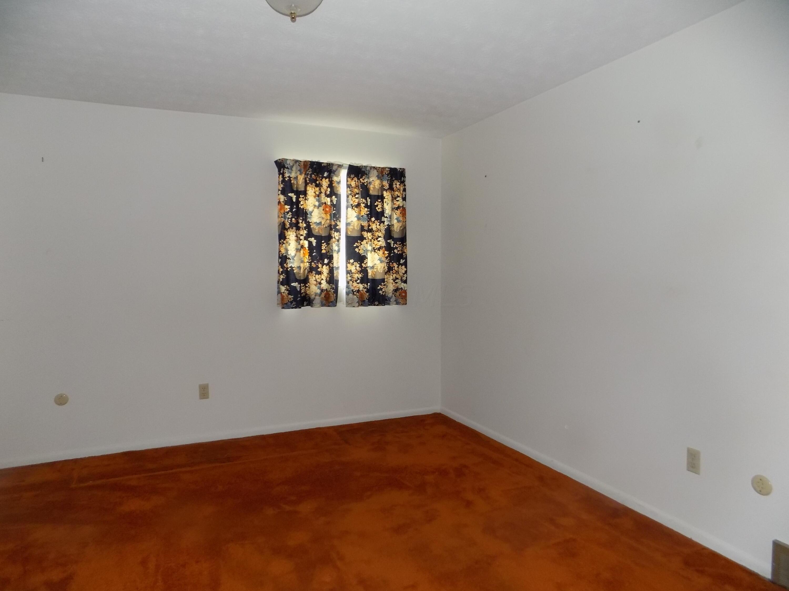 2100 Sale Road Columbus, OH 43224 - Photo 11 of 24 Carpeting is in good shape and there is hardwood flooring underneath if desired!