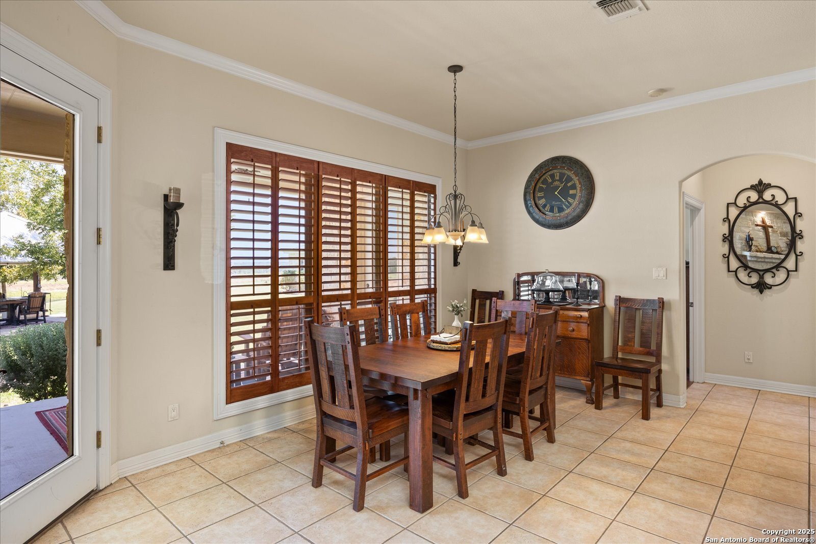 34 Cravey Road Boerne, TX 78006 - Photo 12 of 57 a view of a dining room and livingroom with furniture window and wooden floor