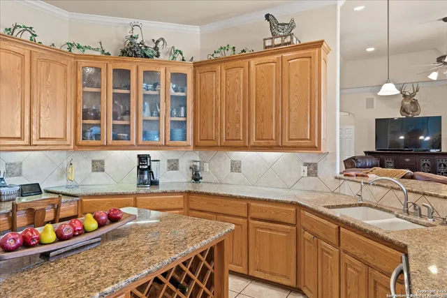 a large bathroom with a large tub and sink