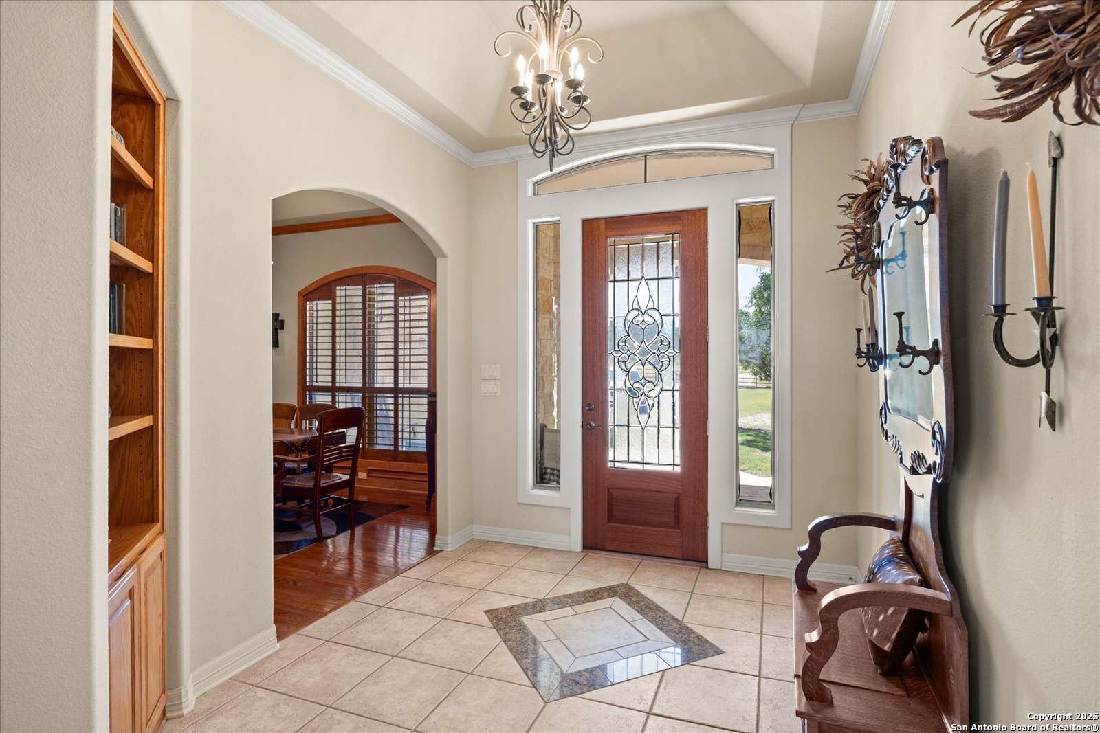34 Cravey Road Boerne, TX 78006 - Photo 19 of 57 a living room with furniture a dining table and a large window