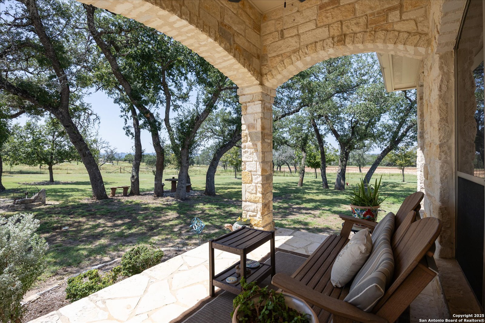34 Cravey Road Boerne, TX 78006 - Photo 4 of 57 a view of a yard with furniture and a tree