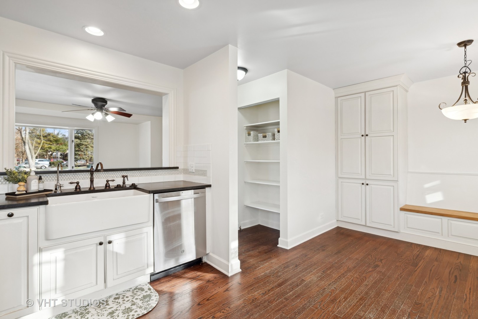 601 Long Road Glenview, IL 60025 - Photo 8 of 27 a kitchen with white cabinets and white appliances