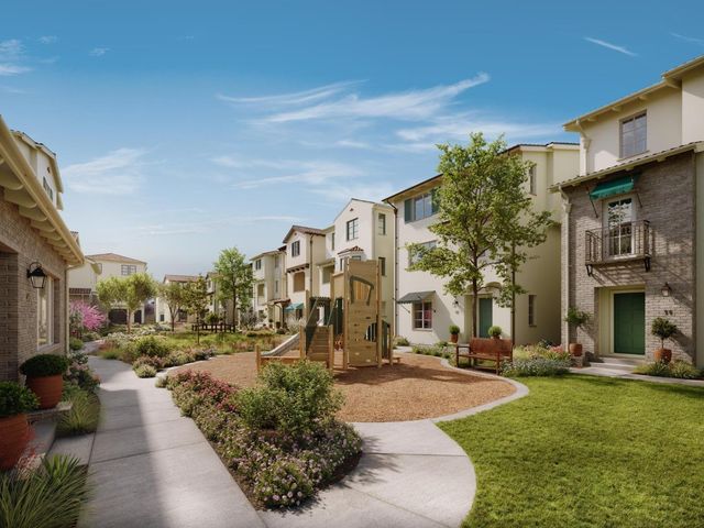 a view of a building with a yard