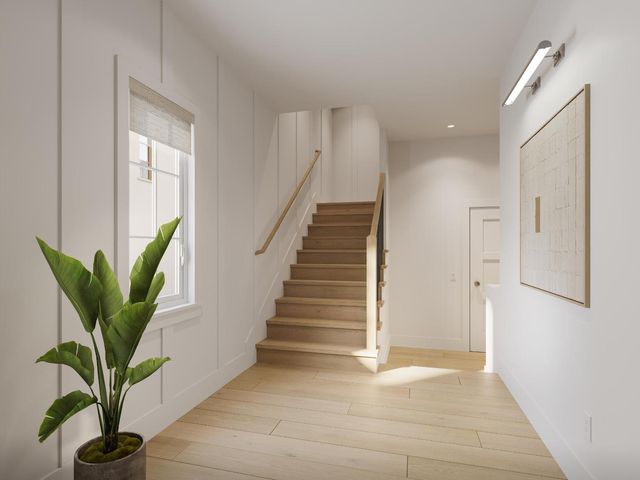 a bed room with furniture and wooden floor