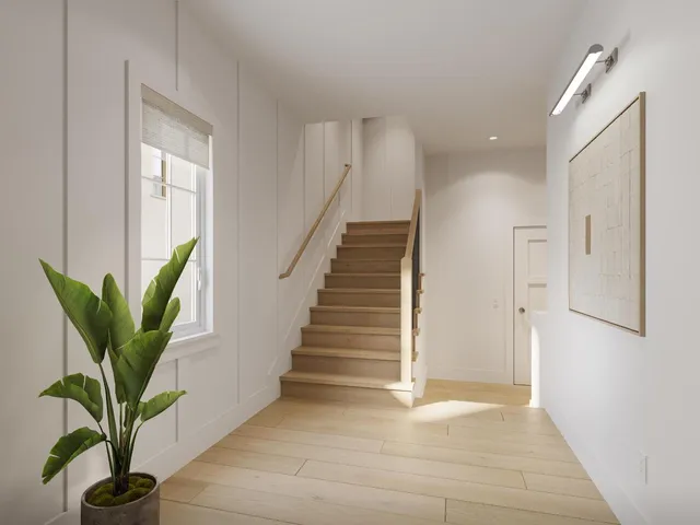 a bed room with furniture and wooden floor