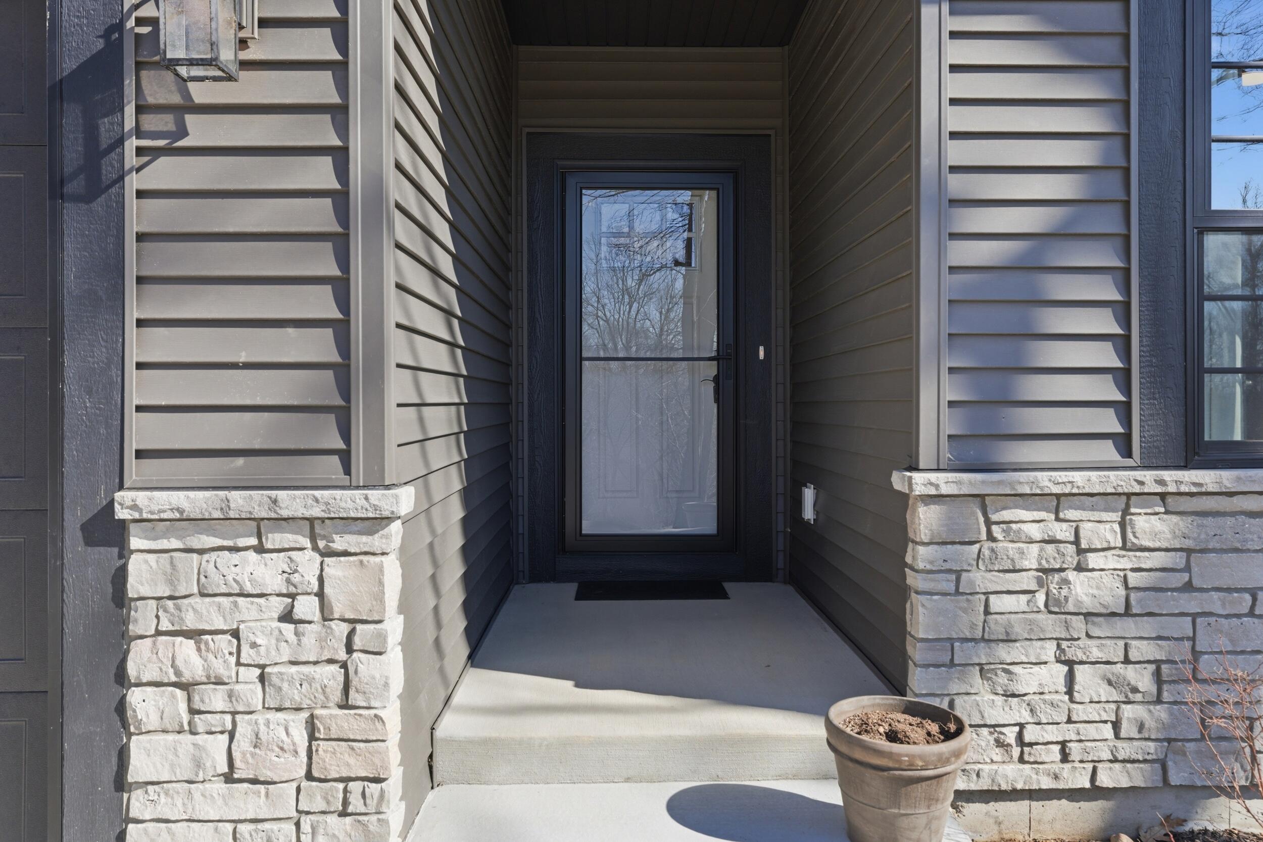 W433 Helen Lane Osceola, WI 53010 - Photo 31 of 49 Covered Front Door