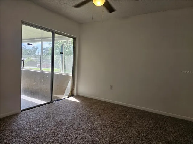 an empty room with sliding door