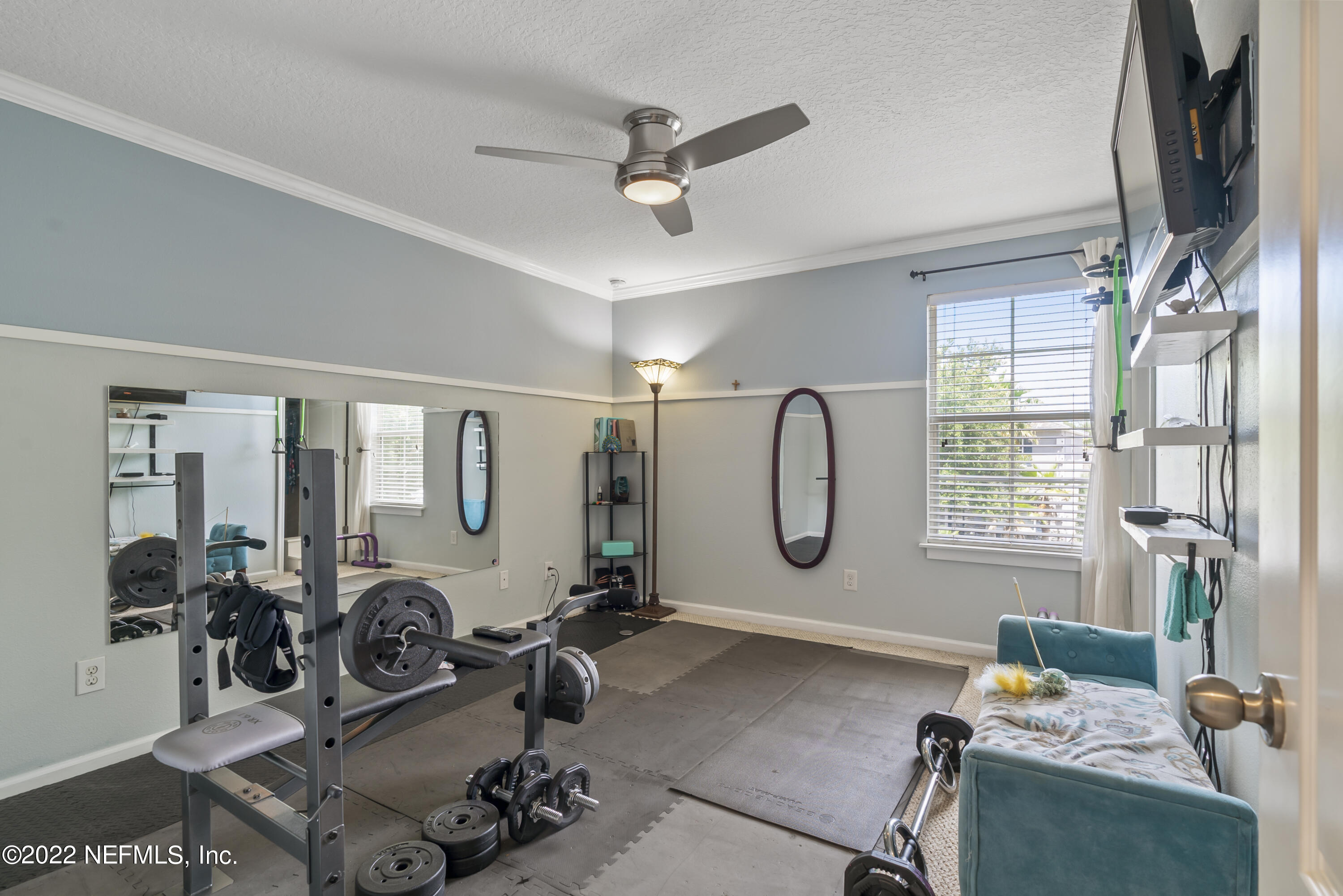16372 Tisons Bluff Road Jacksonville, FL 32218 - Photo 30 of 51 a room with furniture and a window