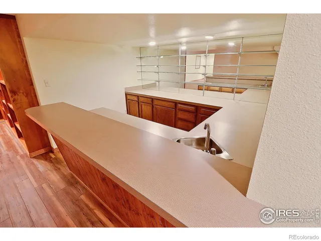 a bedroom with a bed and chair