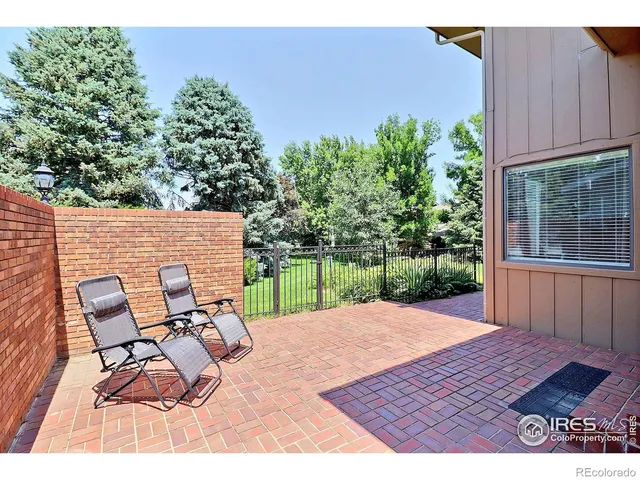 a view of a outdoor space with a patio and backyard