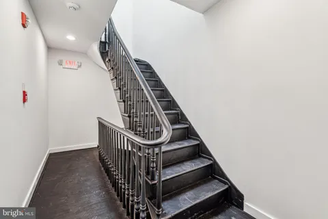 a view of entryway with wooden floor