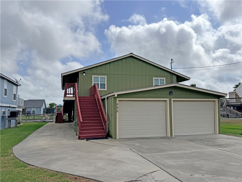 105 Copano Cove Road Rockport, TX 78382 - Photo 2 of 40 a view of a house with a yard