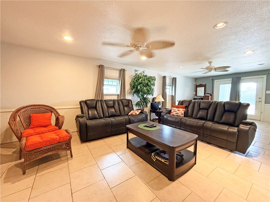 105 Copano Cove Road Rockport, TX 78382 - Photo 23 of 40 a living room with furniture
