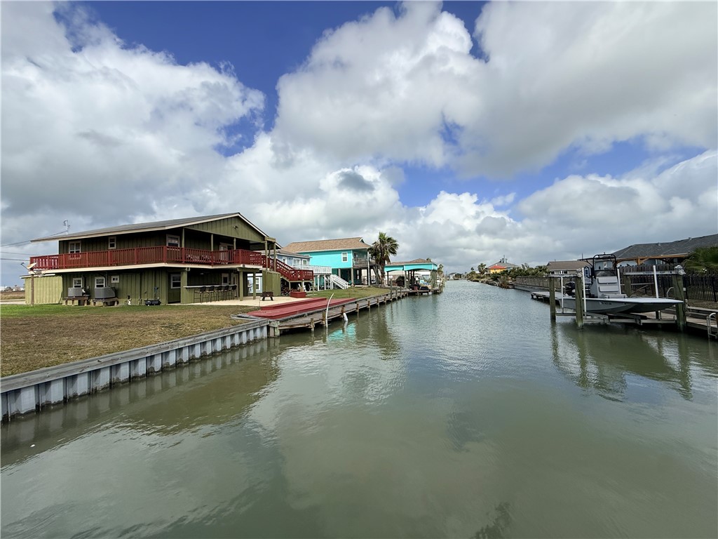 105 Copano Cove Road Rockport, TX 78382 - Photo 3 of 40 a view of a lake with boats in it