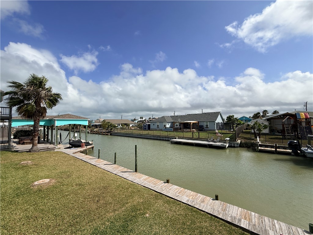 105 Copano Cove Road Rockport, TX 78382 - Photo 38 of 40 a view of a lake with a house