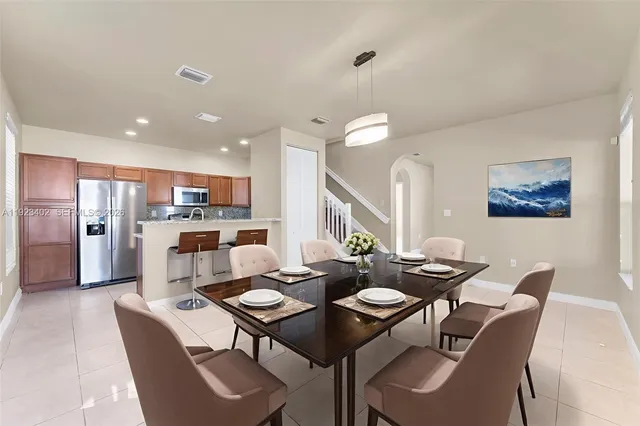 a view of a dining room with furniture