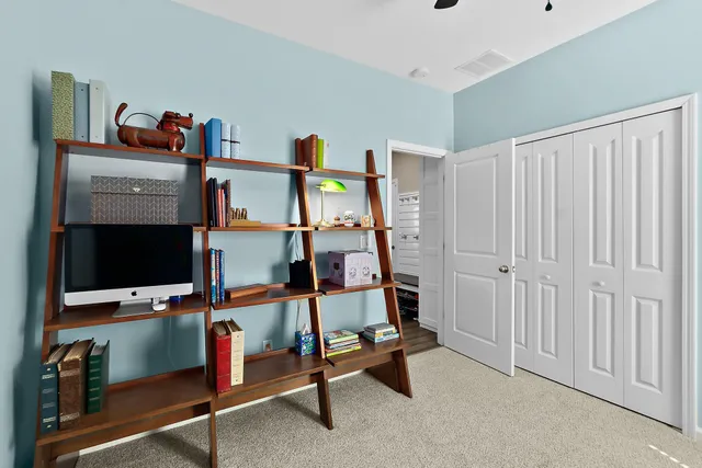 a living room with furniture and a couch