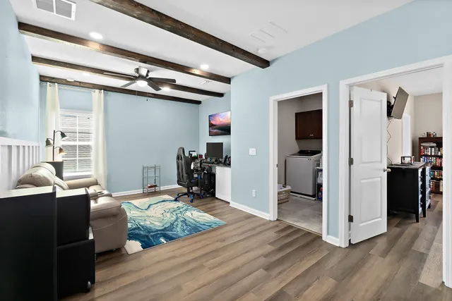 a bathroom with a double vanity sink and a mirror