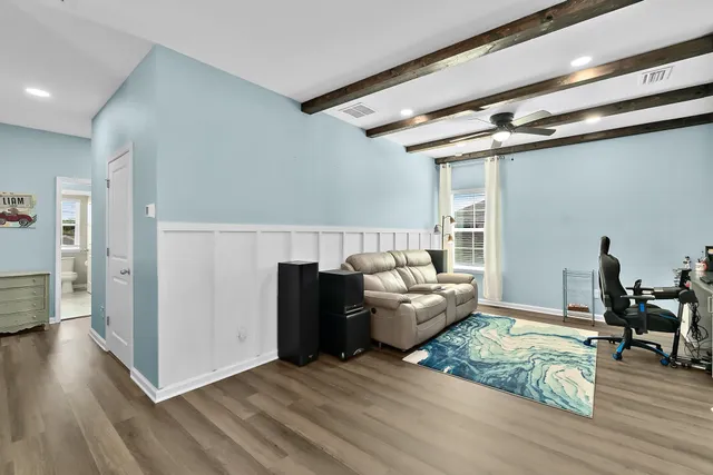 a bathroom with a sink vanity granite and shower