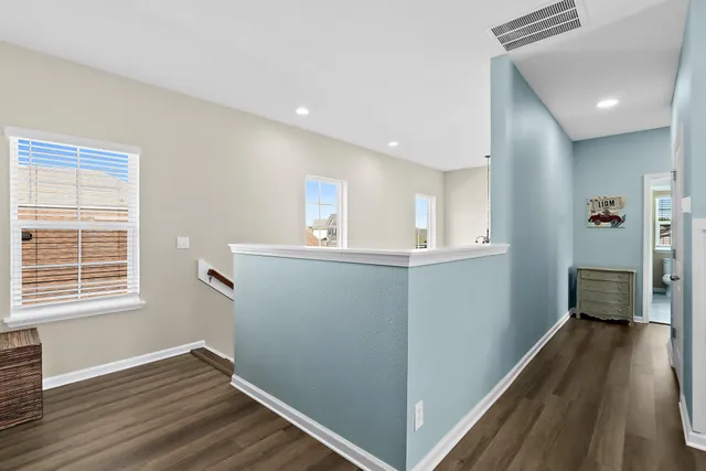a view of storage and utility room with washer and dryer
