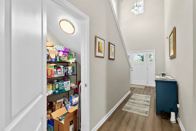 a living room with fireplace furniture and a flat screen tv