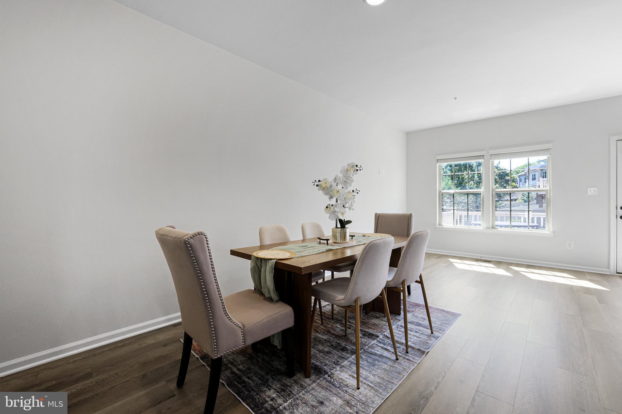 2741 Prospect Hill Drive Hanover, MD 21076 - Photo 14 of 64 a view of a dining room with furniture and wooden floor