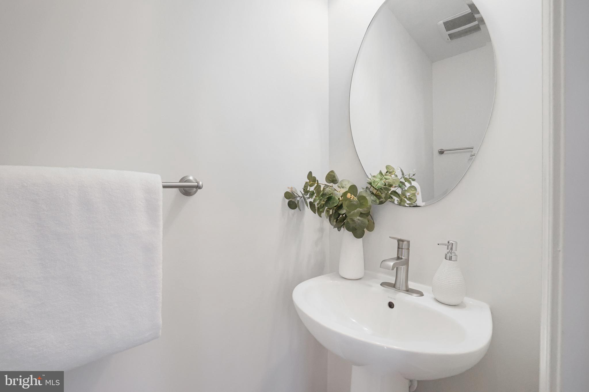 2741 Prospect Hill Drive Hanover, MD 21076 - Photo 20 of 64 a bathroom with a sink and mirror