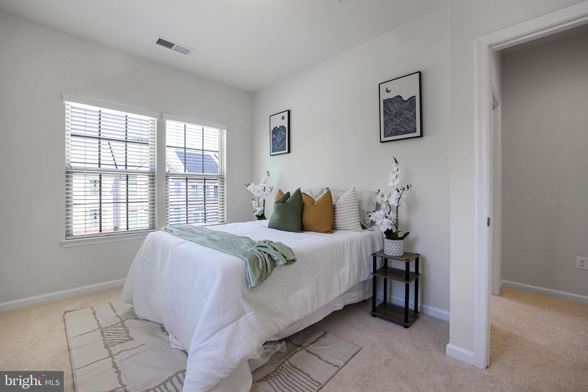2741 Prospect Hill Drive Hanover, MD 21076 - Photo 30 of 64 a spacious bedroom with a bed and a window