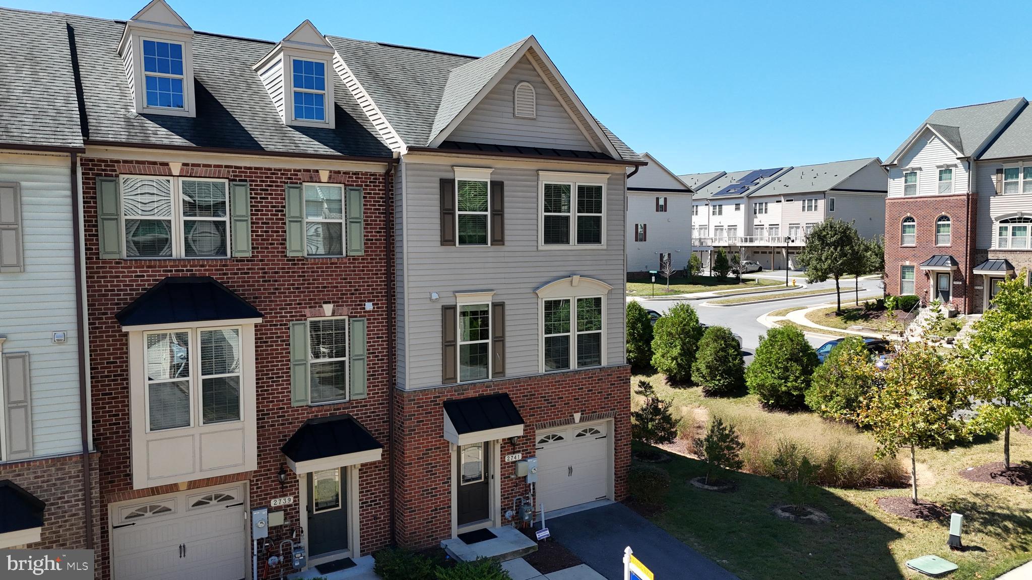2741 Prospect Hill Drive Hanover, MD 21076 - Photo 3 of 64 a view of multiple houses with a yard