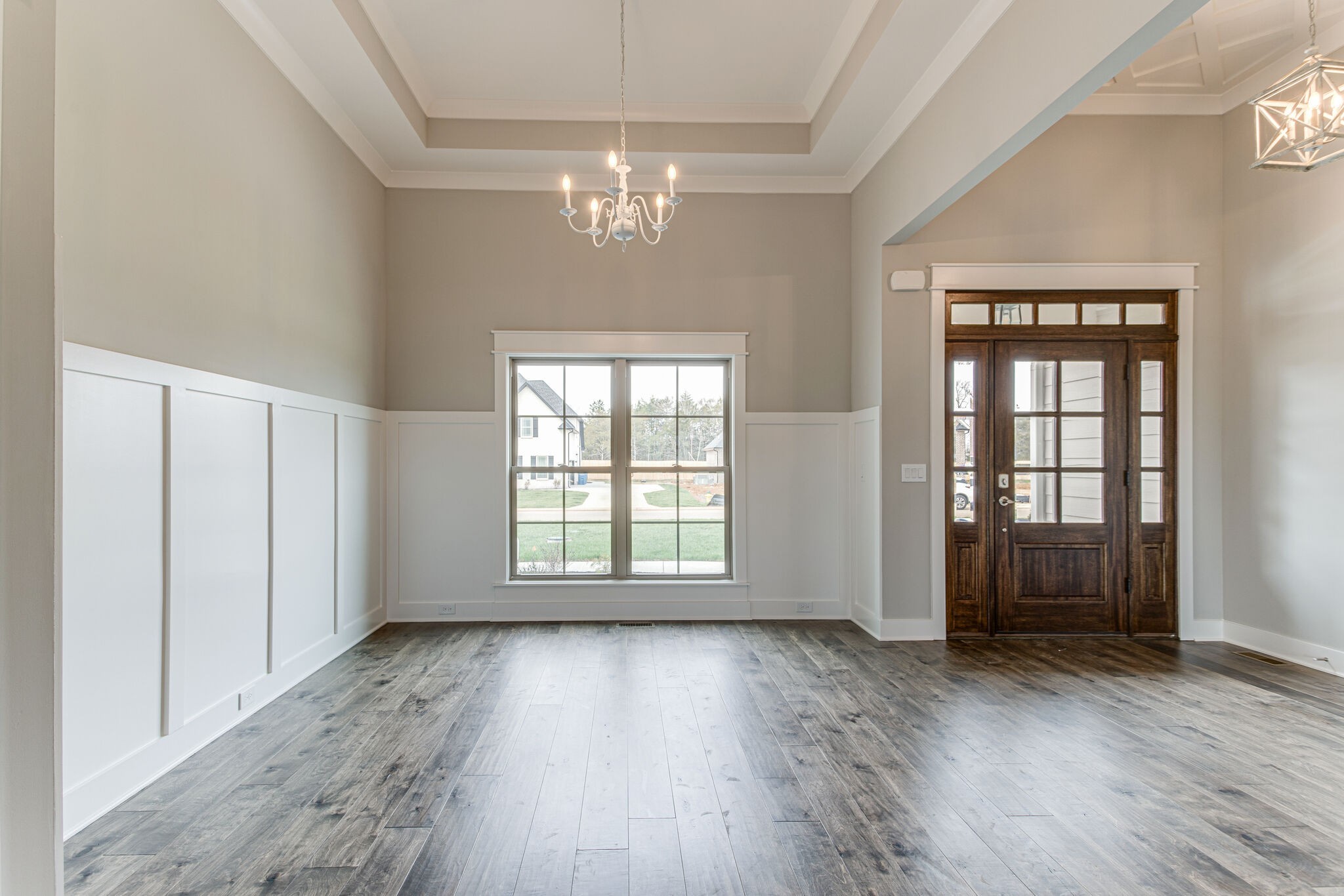 2617 Holly Spring Drive Murfreesboro, TN 37128 - Photo 11 of 50 a view of an empty room with wooden floor and a window