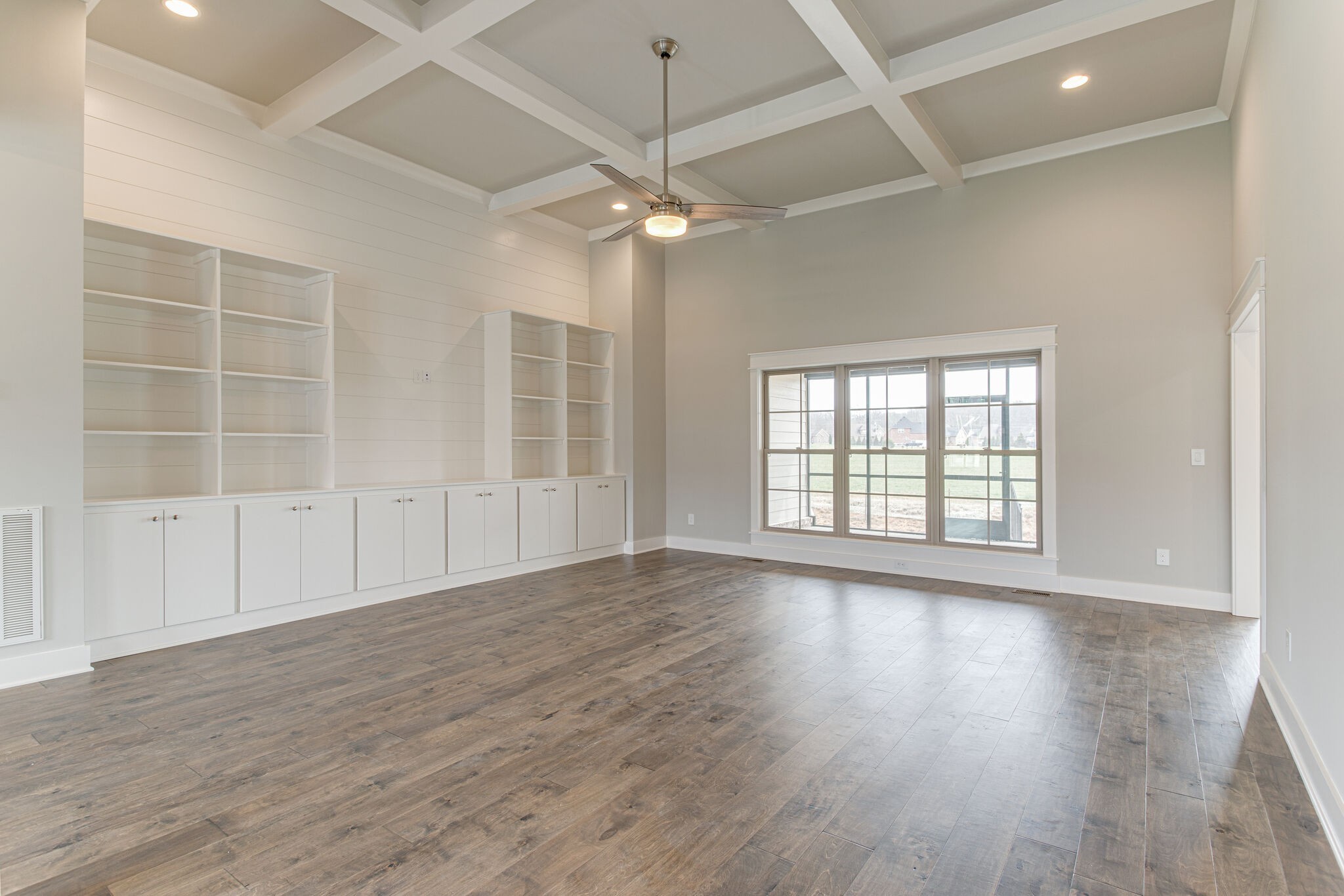 2617 Holly Spring Drive Murfreesboro, TN 37128 - Photo 13 of 50 wooden floor in an empty room with a window