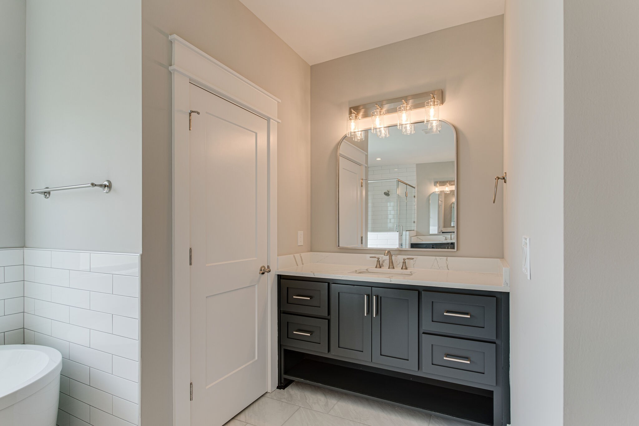 2617 Holly Spring Drive Murfreesboro, TN 37128 - Photo 22 of 50 a bathroom with a double vanity sink and a mirror