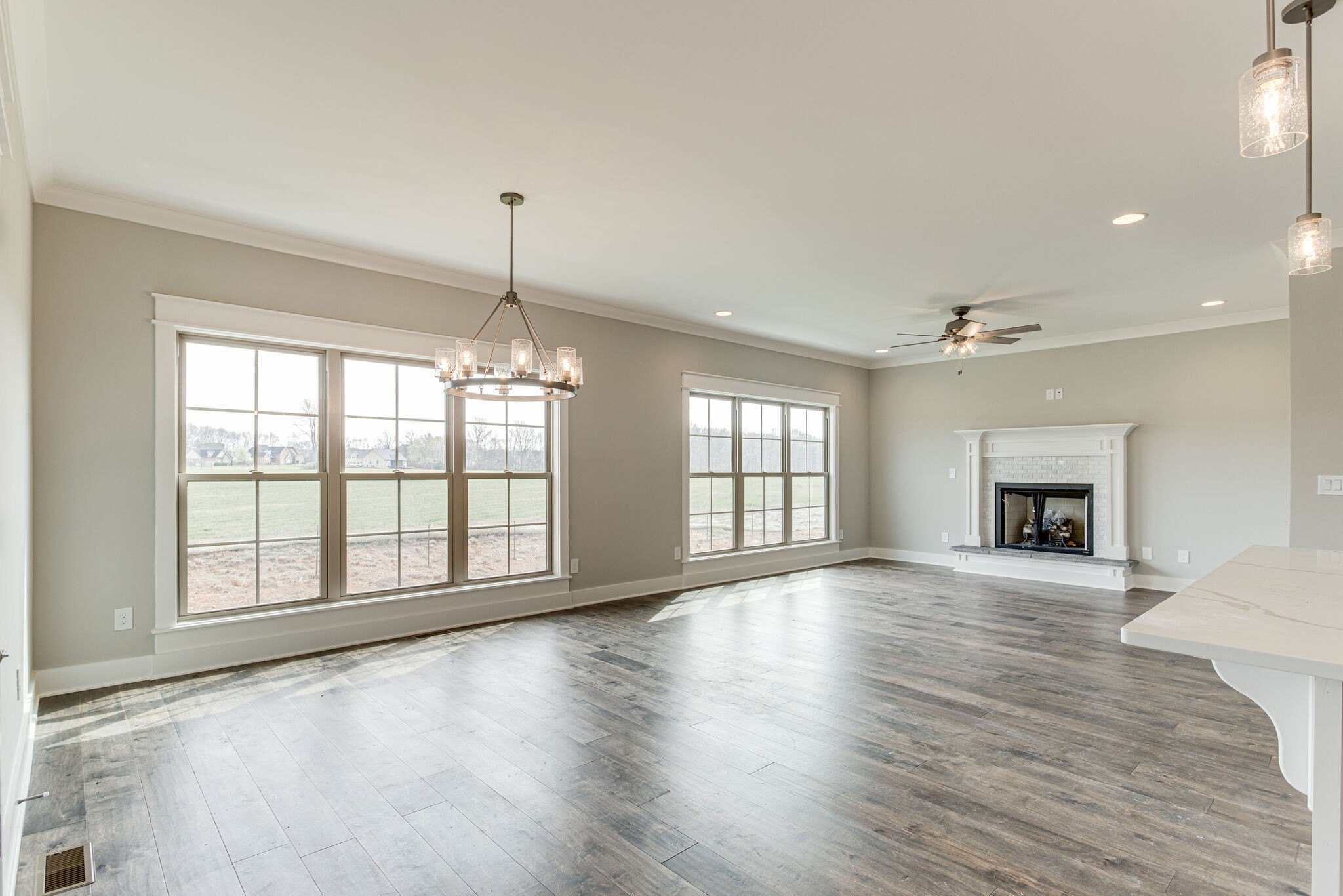 2617 Holly Spring Drive Murfreesboro, TN 37128 - Photo 29 of 50 an empty room with windows and fireplace