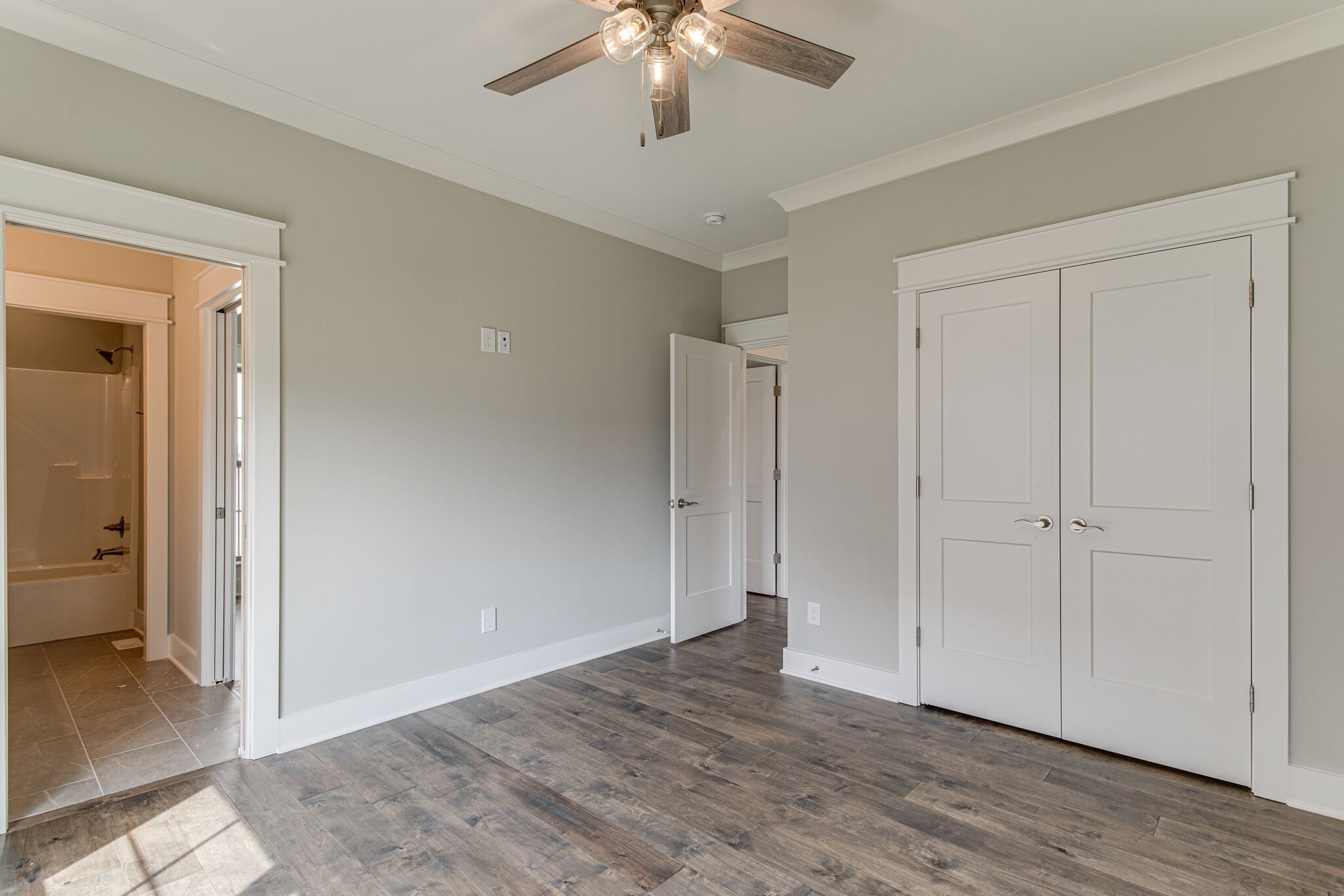 2617 Holly Spring Drive Murfreesboro, TN 37128 - Photo 36 of 50 a view of an empty room and wooden floor chandelier fan