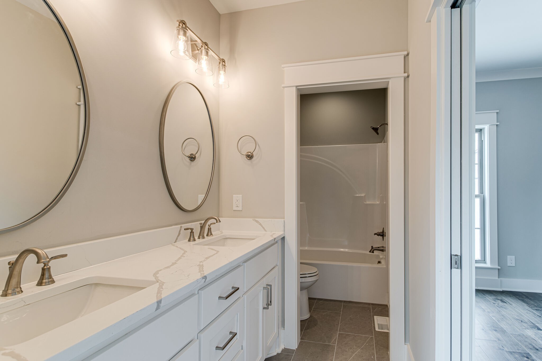 2617 Holly Spring Drive Murfreesboro, TN 37128 - Photo 37 of 50 a bathroom with a double vanity sink and a mirror