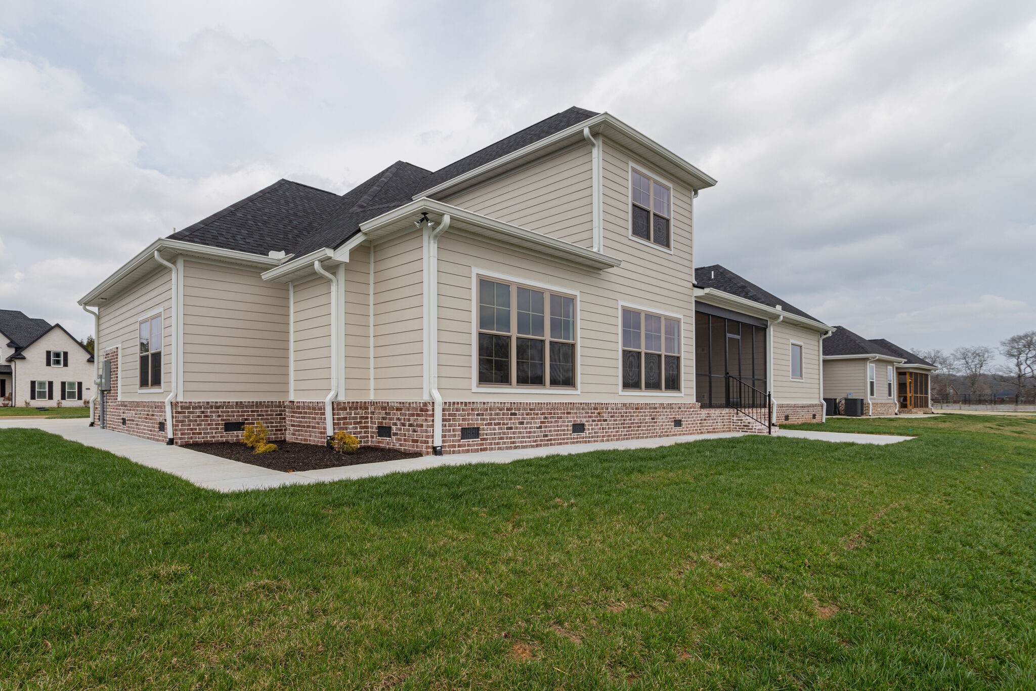 2617 Holly Spring Drive Murfreesboro, TN 37128 - Photo 49 of 50 a front view of house with a garden and patio