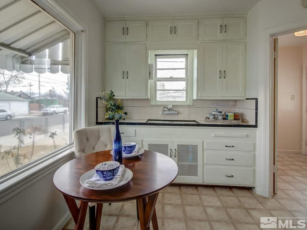 1215 Wheeler Avenue Reno, NV 89502 - Photo 12 of 25 a dining room with furniture and window