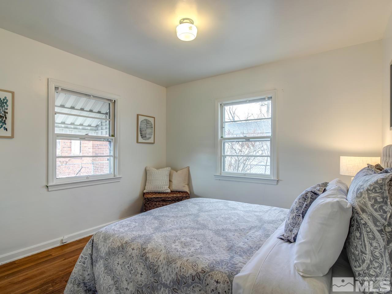 1215 Wheeler Avenue Reno, NV 89502 - Photo 14 of 25 a bedroom with a bed and a window