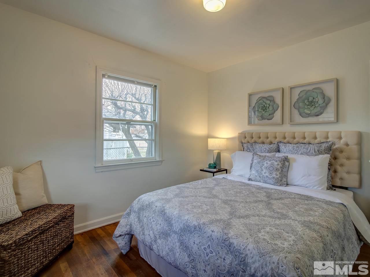 1215 Wheeler Avenue Reno, NV 89502 - Photo 15 of 25 a bedroom with a bed and a couch